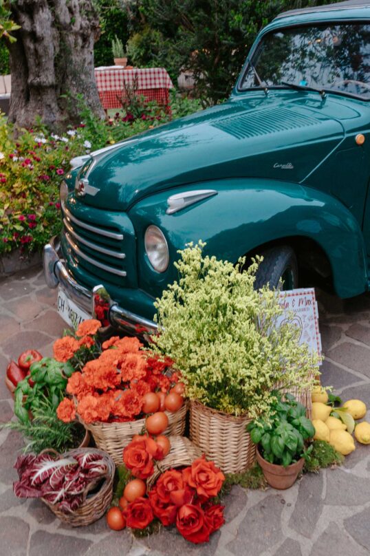 299_JIN_4608 Vintage Italian car decorated with flowers for the welcome dinner